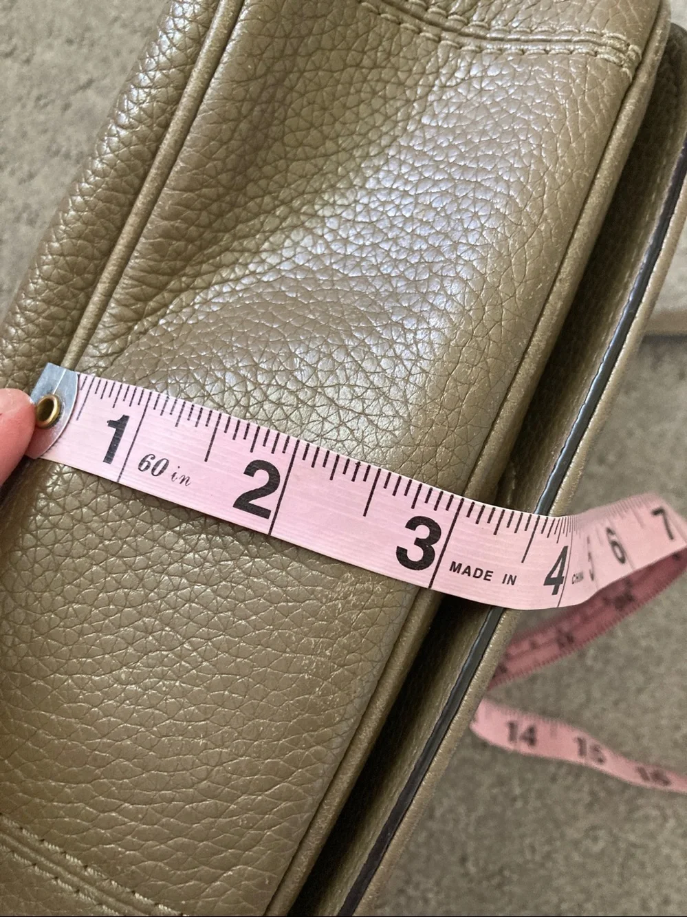 Marc Jacobs taupe leather crossbody bag.